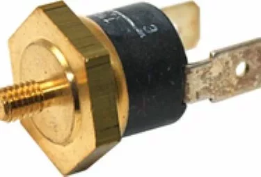 A close-up of the Isomac 000284 Steam Thermostat - 135 degree No. 31 for Isomac Venus, showing its brass and black design with a threaded stud on one end and two flat electrical terminals on the other. © 2025 1st-line.com