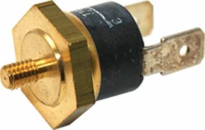 A close-up of the Isomac 000284 Steam Thermostat - 135 degree No. 31 for Isomac Venus, showing its brass and black design with a threaded stud on one end and two flat electrical terminals on the other. © 2025 1st-line.com