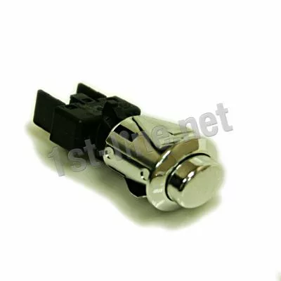 Close-up of an Isomac 000523 Chrome Oval Switch with a black plastic base, shown on a white background. © 2025 1st-line.com