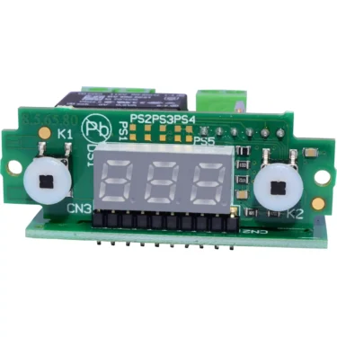 The DISCONTINUED Bezzera 7434019 PID Display is a green electronic circuit board featuring a digital numeric PID display, labeled buttons, connectors, and various components, shown from the front. © 2025 1st-line.com