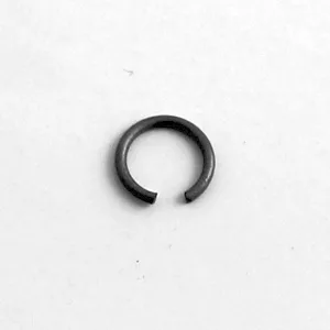 The Ponte Vecchio C-Clip for pin lever support - Export is a small, black, metal circular ring with a gap, shown on a plain white background, resembling an open jump ring. © 2025 1st-line.com