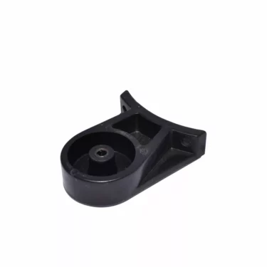 The Macap Holder for Tamper/Press is a black plastic holder with a round base and two screw holes on an angled flat section, shown isolated on a white background. © 2025 1st-line.com