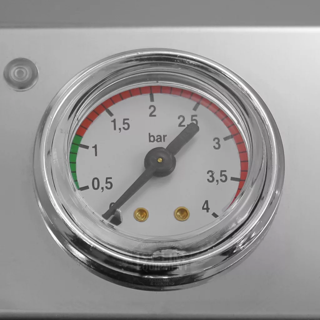 A close-up of a DISCONTINUED VBM Domobar Super Switchable HX Espresso Machine - Rotary Pump pressure gauge shows 0–4 bar, the needle just above 2.5 bar, and colored zones (green, yellow, red) marking safe to high pressure levels. © 2025 1st-line.com