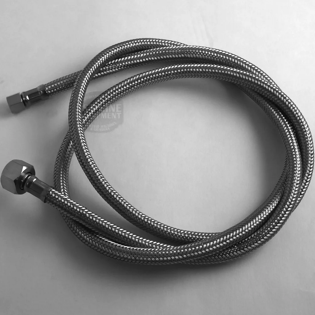A coiled metal braided hose with hexagonal connectors, designed for the DISCONTINUED ECM Technika Profi IV HX Switchable Espresso Machine, rests on a plain white surface. © 2025 1st-line.com
