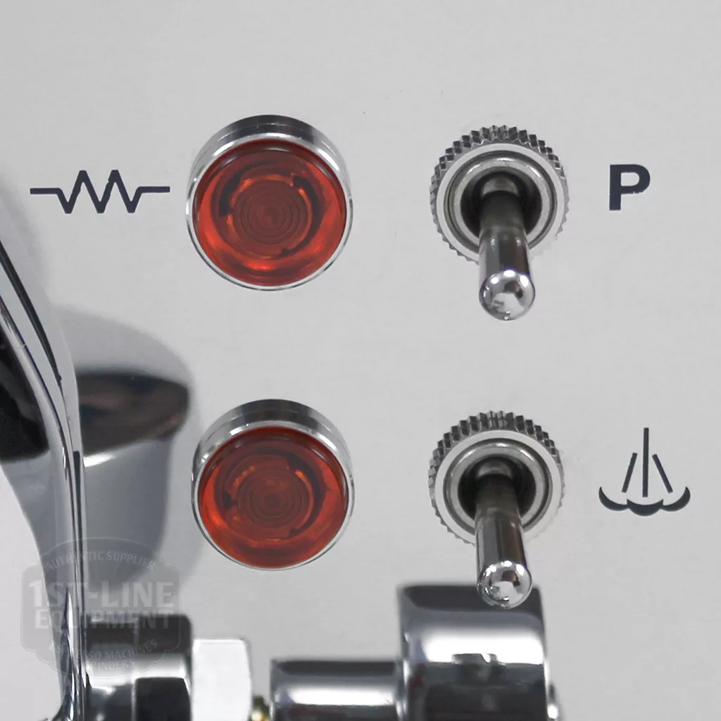 Close-up of the control panel on the DISCONTINUED ECM Classika PID Espresso Machine, showing two toggle switches with red indicator lights and symbols for power and steam functions. © 2025 1st-line.com