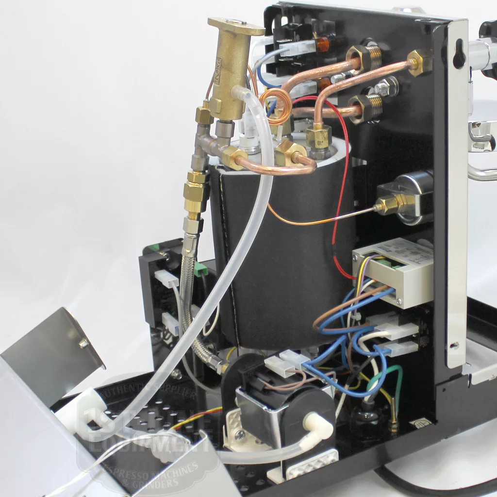 The image displays the internal components—wires, copper pipes, boiler, and electrical parts—of the DISCONTINUED ECM Classika PID Espresso Machine with its side panel open for viewing. © 2025 1st-line.com