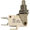 A close-up of the Lelit GV211 E61 Grouphead Lever Microswitch, a metal push-button switch with a white plastic base, two metal terminals, and technical details printed on its side. © 2025 1st-line.com
