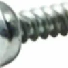 A close-up of the Lelit MC076 Front Panel Screw, featuring a round top and threaded body, is shown positioned horizontally on a white background. © 2025 1st-line.com