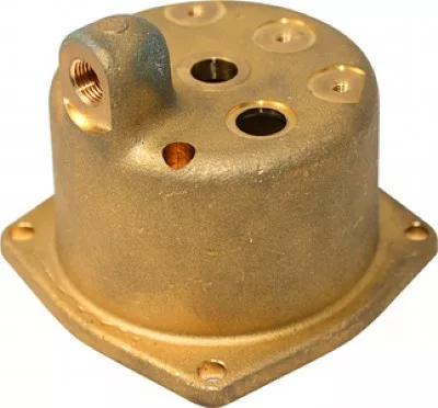 Brass valve cover with hexagonal base, multiple circular holes, and a raised threaded port on top; used in industrial or mechanical settings like the DISCONTINUED Lelit MC061 Upper Boiler Body. © 2025 1st-line.com