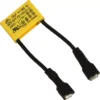 The Lelit MC429/110 Condenser is a yellow rectangular capacitor with black printed text, two black insulated wires ending in metal connectors, 0.33µF 250V specs, certification marks, and is compatible with Lelit machines. © 2025 1st-line.com