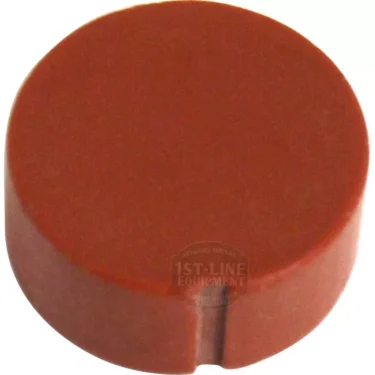 The Lelit 8700002 Steam Valve Gasket / Seal is a round, flat brown disk with a smooth surface and a small notch on the edge, shown against a white background. © 2025 1st-line.com