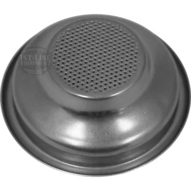 The Lelit MC754 Filter Basket / Cup - 1-cup, 58 mm is shown upside down, displaying its flat surface with multiple small holes in the center that allow water to flow through during coffee brewing. © 2025 1st-line.com