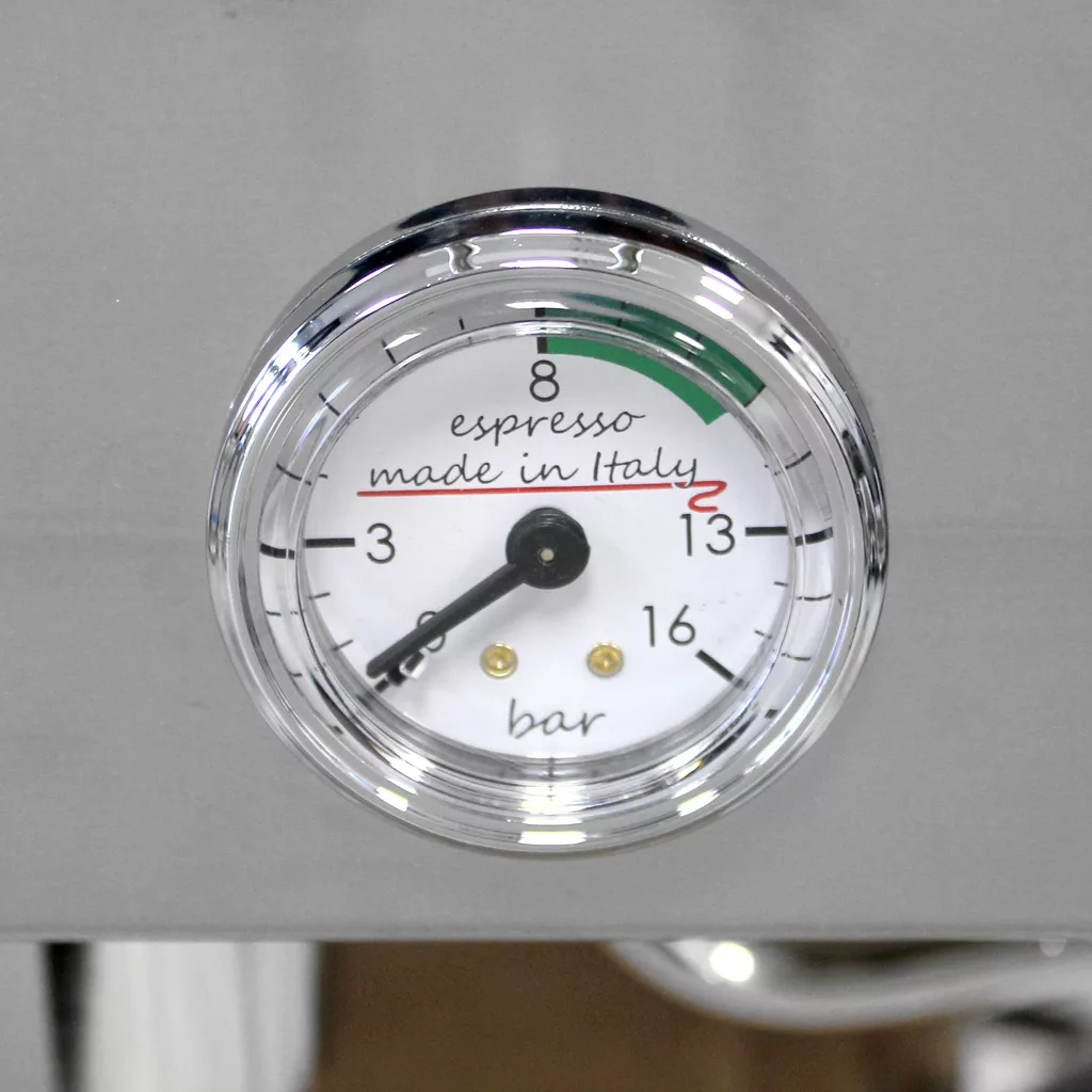 A close-up of the Lelit PL41TEM Anna PID Espresso Machine’s round pressure gauge, labeled espresso made in Italy, displaying 0–16 bars with a green optimal zone from 8 to 12 bars. © 2025 1st-line.com