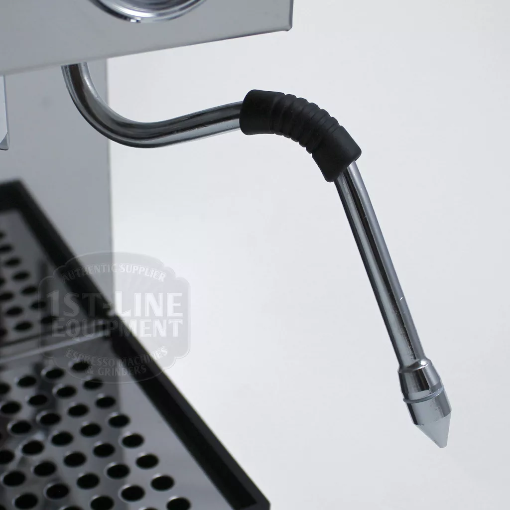 Close-up of the Lelit PL41TEM Anna PID Espresso Machine’s steam wand with a black rubber grip, shown above a metal drip tray with round holes, highlighting the wand, tray, and part of the machine’s housing. © 2025 1st-line.com