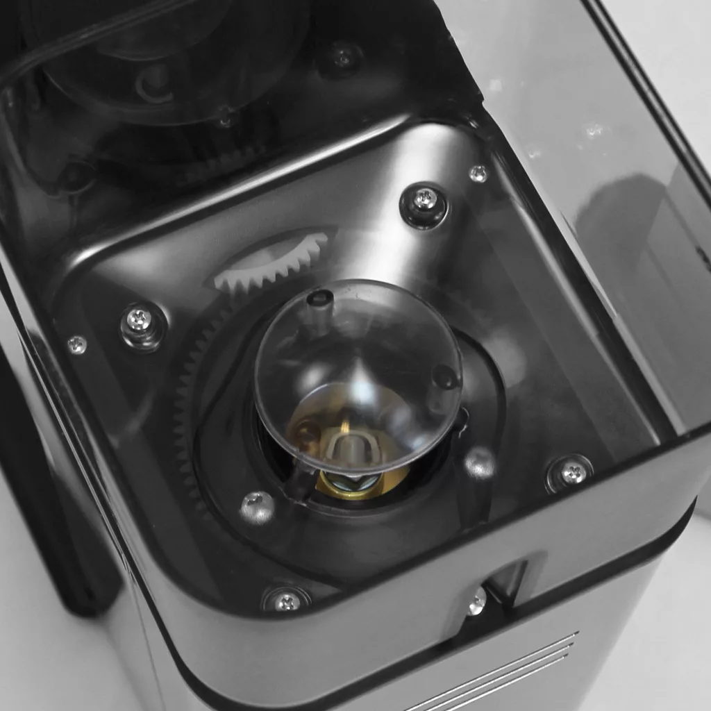 Close-up view of the inside of the DISCONTINUED Lelit PL71 William Espresso Coffee Grinder, showing metal burrs and transparent plastic parts with the top cover removed to reveal its grinding mechanism. © 2025 1st-line.com