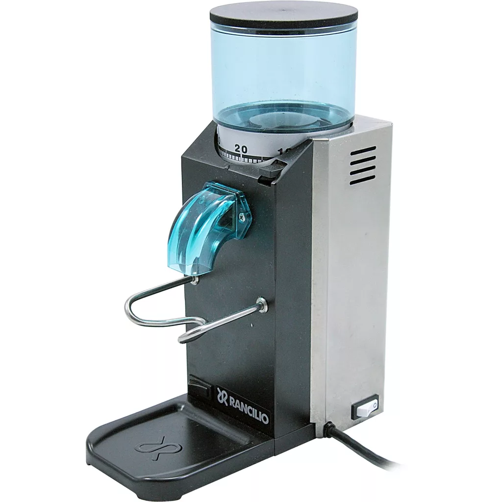 The DISCONTINUED Rancilio Rocky Doserless V3 Espresso Coffee Grinder has a stainless steel and black design, a clear blue bean hopper, and a doserless mechanism with the Rancilio name on the front base tray. © 2025 1st-line.com