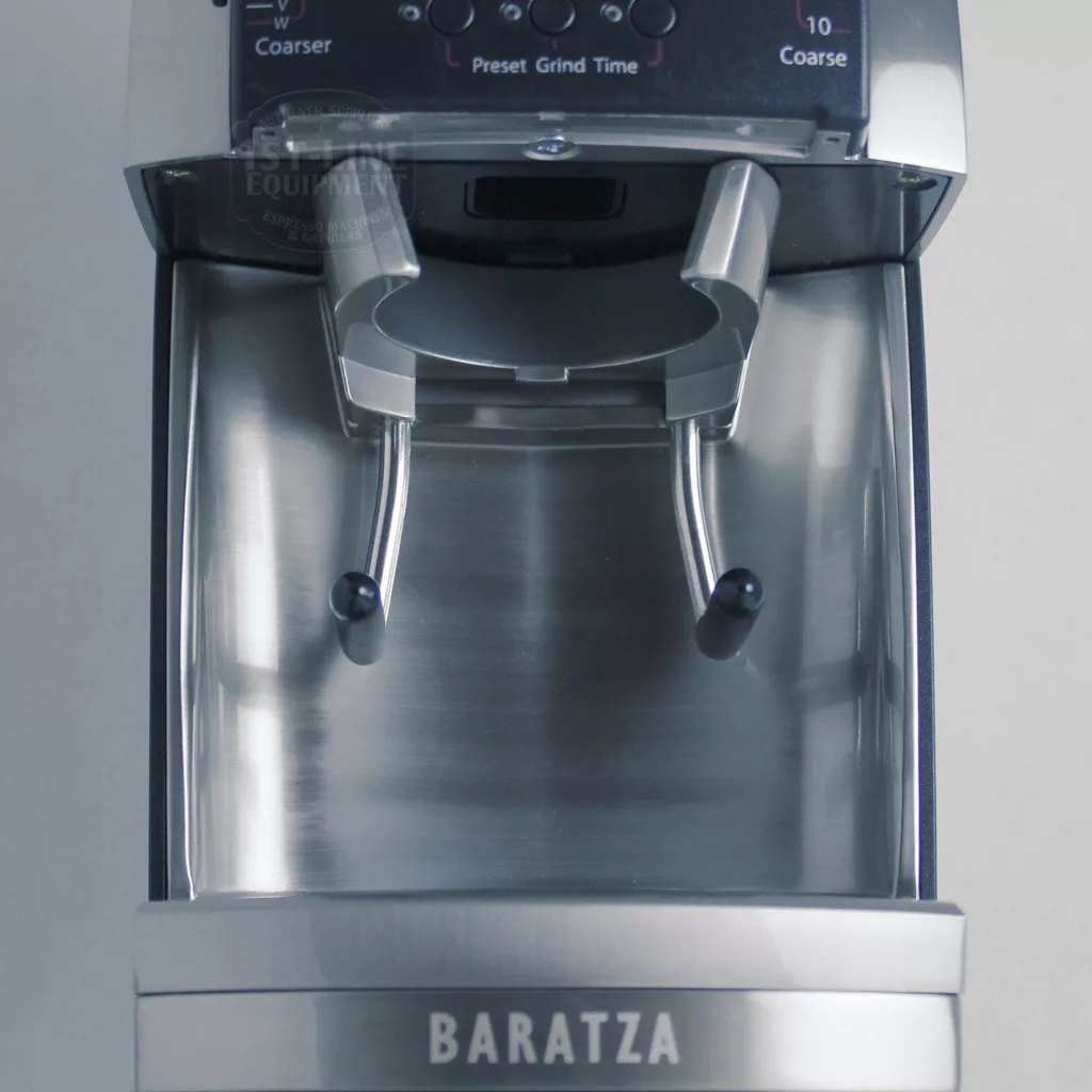 Close-up of the discontinued Baratza Vario Coffee Grinder with an empty portafilter holder and stainless steel finish, viewed from above. © 2025 1st-line.com
