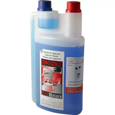 A 1-liter plastic bottle of REDIRECTED Ascaso V..570 Milk Washer / Steam Wand Cleaner with blue liquid, two caps (red and blue), and a label with a coffee cup image and cleaning instructions. © 2025 1st-line.com