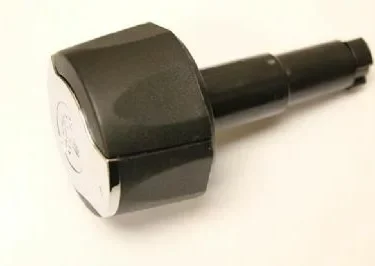 A black, hexagonal wheel lock key tool with a metallic tip is ideal for installing or removing the Rancilio 10060186 Steam Knob, shown on a plain white background. © 2025 1st-line.com