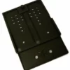 A black plastic SIM card cutter with alignment slots and holes, designed for trimming SIM cards to size, has a construction similar to the Rancilio 38123677 Plastic Base for Rancilio Rocky V3. © 2025 1st-line.com