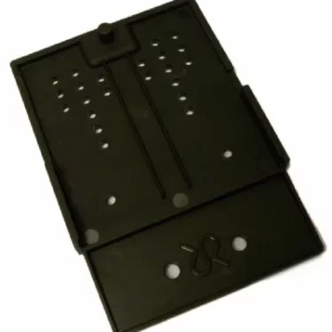 A black plastic SIM card cutter with alignment slots and holes, designed for trimming SIM cards to size, has a construction similar to the Rancilio 38123677 Plastic Base for Rancilio Rocky V3. © 2025 1st-line.com