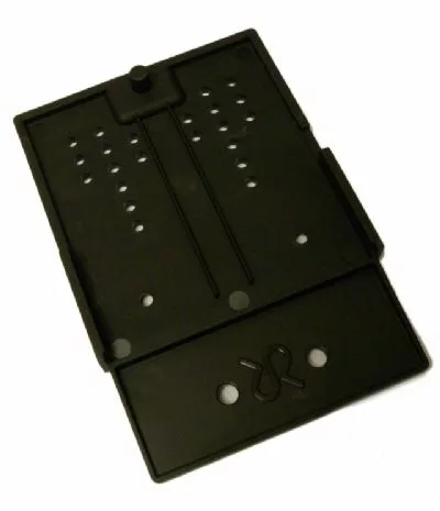 A black plastic SIM card cutter with alignment slots and holes, designed for trimming SIM cards to size, has a construction similar to the Rancilio 38123677 Plastic Base for Rancilio Rocky V3. © 2025 1st-line.com