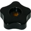 A black, star-shaped Isomac 000216 Steam Knob with a central square brass insert, shown from above on a white background. © 2025 1st-line.com