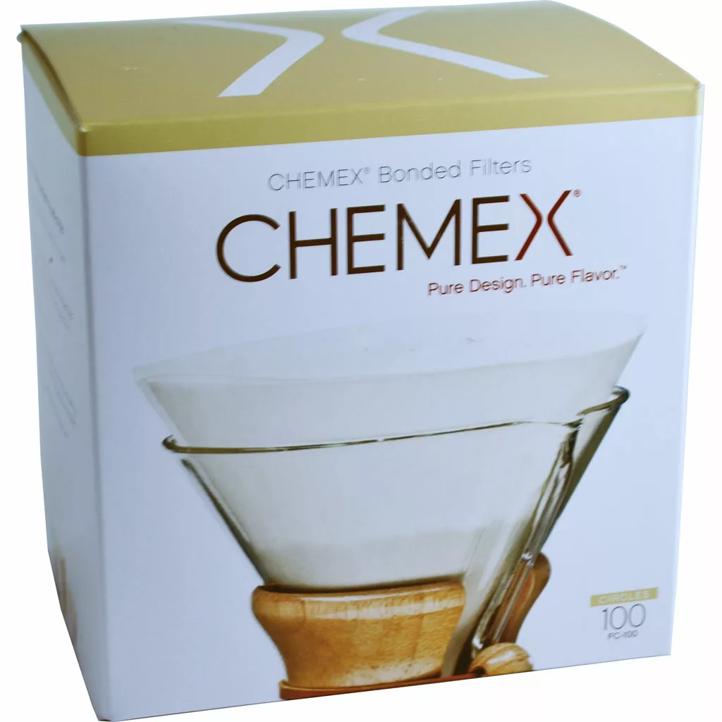 A box of DISCONTINUED Chemex FC-100 Prefolded Circle Coffee Filters (100 count), featuring the Chemex logo and Pure Design. Pure Flavor. phrase. The image shows a Chemex coffeemaker with a wooden collar. © 2025 1st-line.com