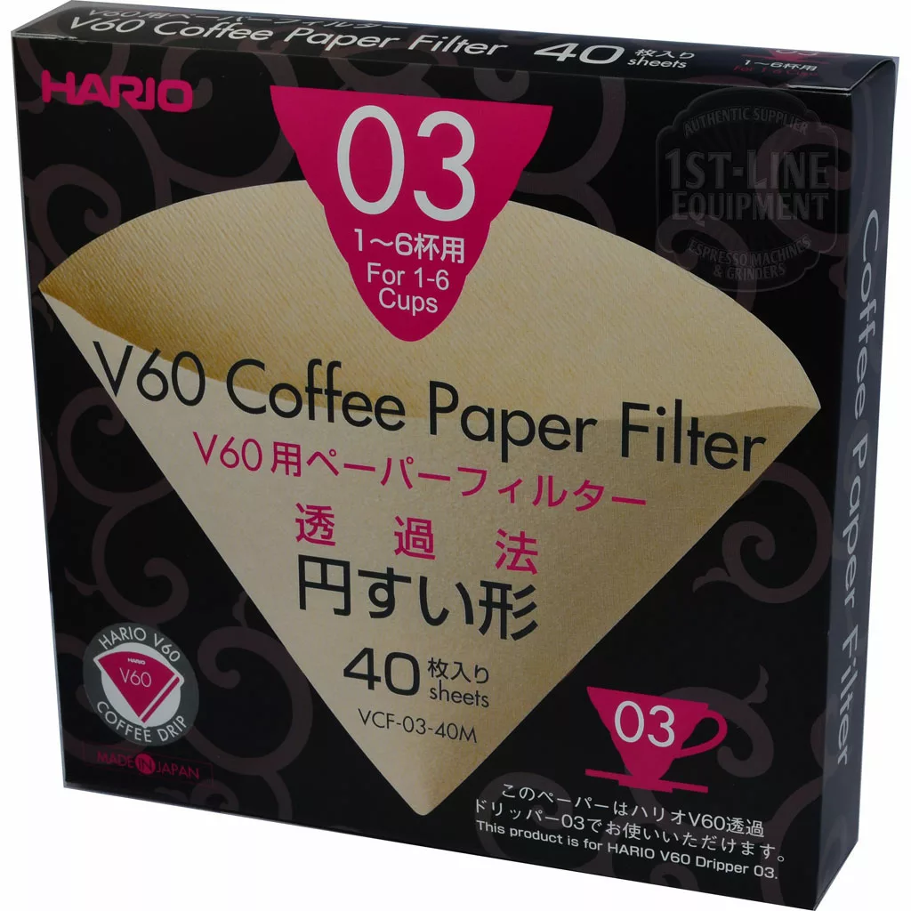 A box of Hario V60 03 Misarashi Paper Filters (40 count) for 1-6 cups in black, pink, and gold packaging with English and Japanese text plus a coffee filter image. © 2025 1st-line.com