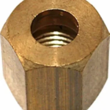 A close-up image of the Elektra 00733014 Steam Knob Nut, a hexagonal brass nut with an internal thread, designed for securing bolts or screws in Elektra espresso machine assemblies. © 2025 1st-line.com