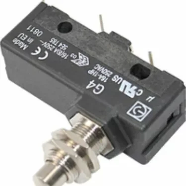 A close-up of a black VBM ELETMICRE Grouphead Microswitch featuring a metal plunger actuator and three electrical terminals, with certification markings and model numbers visible on its surface. © 2025 1st-line.com
