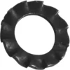 A close-up of a single Rancilio 37430600 Washer for Pump Support Bracket (0.6mm diameter), black and serrated with a wavy, ridged design, photographed against a plain white background. © 2025 1st-line.com