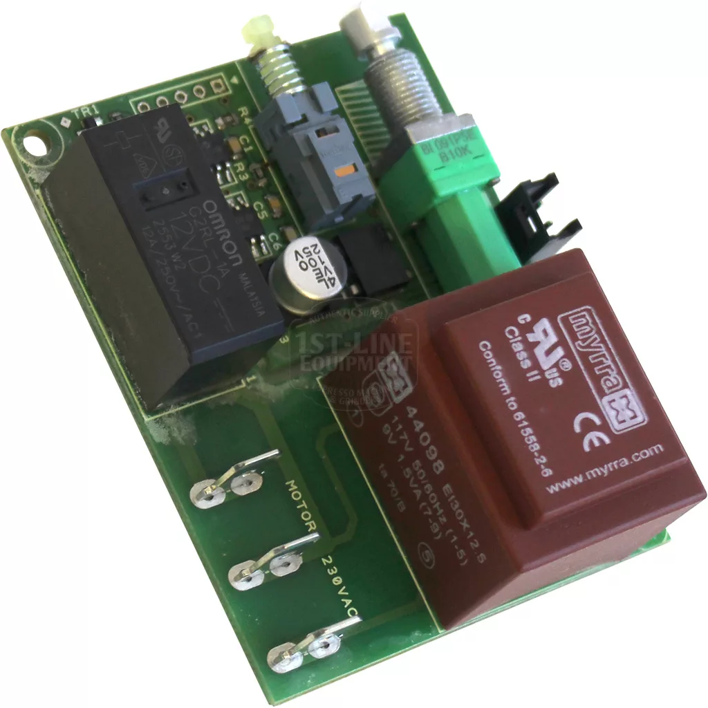 A close-up of the Eureka 1005.0012 Circuit Board, showing black and brown relays, green terminal blocks, connectors, and the “MOTOR 230VAC” label on its bottom edge. © 2025 1st-line.com