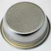 A close-up of the Grimac GR765 2-Cup Filter Basket/Cup with Rim 14g for Zola & MiniGrimac, featuring numerous small holes on its flat metal surface, designed to hold coffee grounds during brewing. © 2025 1st-line.com