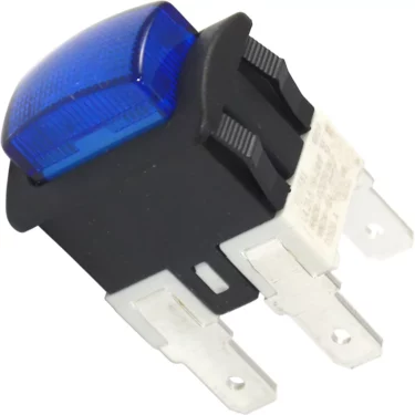 A close-up of the Macap Switch - M2, a blue rectangular rocker switch with three metal prongs and a black housing with a blue translucent cover, commonly used in electronic or automotive applications. © 2025 1st-line.com