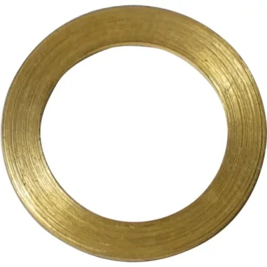 A close-up of the Olympia Ring washer shows its smooth, shiny brass surface, circular shape with a large central hole, gold-colored finish, and subtle texture lines. © 2025 1st-line.com