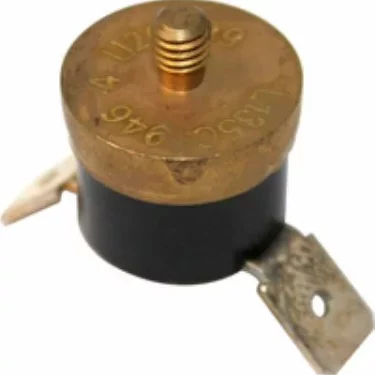 A close-up of the Rancilio 34200075 Thermostat - Steam 135 degree - Screw in, highlighting its round metal and plastic body, two flat terminals, top threaded post, and engraved codes on the brass surface. © 2025 1st-line.com