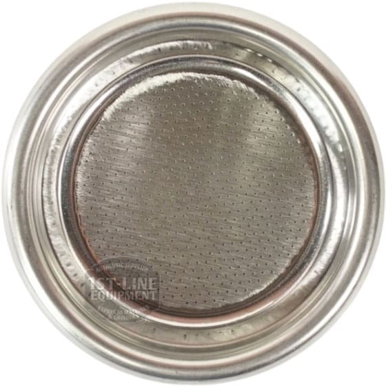 A close-up of the Rancilio 40100010 2-Cup Replacement Filter Basket/Cup highlights its numerous tiny holes and raised edge, making it ideal as a filter basket for espresso machines. © 2025 1st-line.com