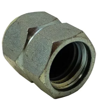 A close-up view of the Rancilio 26220015 Nut, a hexagonal pipe coupling fitting with a threaded interior and slightly worn surface, shown isolated on a white background. © 2025 1st-line.com