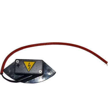 A compact Quamar Microswitch - T48 features a metal base, black box with a yellow high-voltage warning symbol, and red and black wires attached, shown on a white background. © 2025 1st-line.com