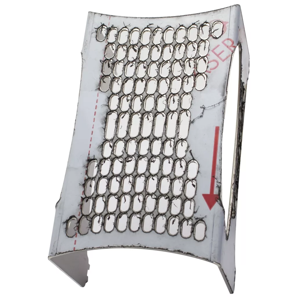 A curved, white metal sheet—identified as the ACS VEN0038 Drip Tray Stand / Extension—features rows of oval holes, welding or burn marks on its edges, and a red dashed line with an arrow on its surface. © 2025 1st-line.com