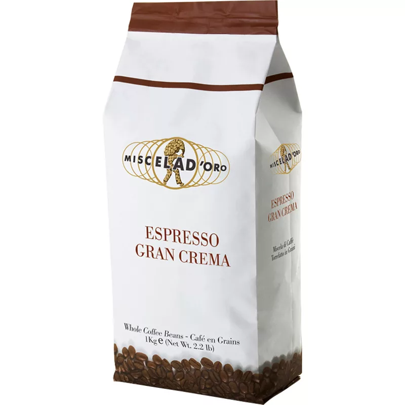A discontinued 2.2 lb bag of Miscela dOro Gran Crema Roasted Coffee Beans, featuring distinctive brown branding and coffee bean illustrations near the bottom. © 2025 1st-line.com