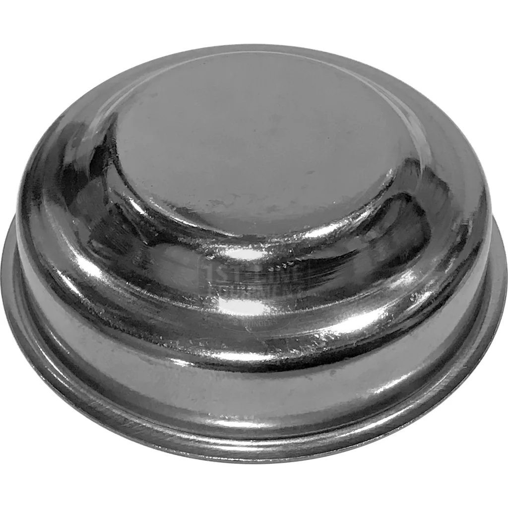 A discontinued Ascaso I..336 57mm round metallic blind filter basket/cup with a slightly domed, smooth, reflective surface—typically used for covering and protecting group heads in espresso machines. © 2025 1st-line.com