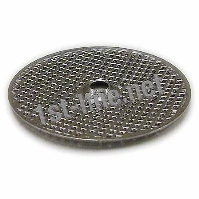 A Grimac POD Filter Screen for MiniGrimac espresso machines, made of round metal with a textured, perforated surface and central hole, is shown on a white background. 1st-line.net appears across the image. © 2025 1st-line.com
