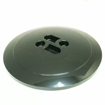 A large, dark green, round plastic button with four holes in a unique pattern resembles the Macap C0007M114 Bean Hopper Cover when viewed against a plain white background. © 2025 1st-line.com