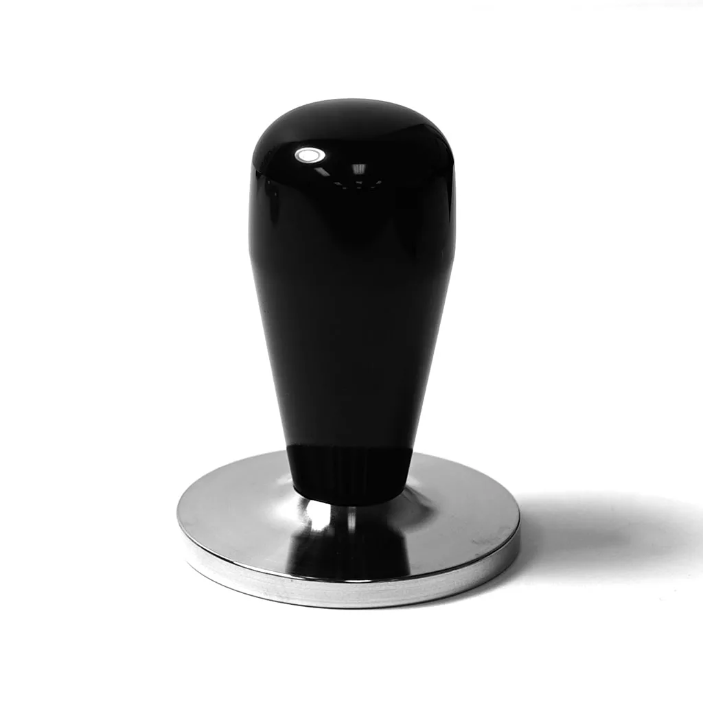 A metal and black coffee tamper with a rounded handle stands upright on a white background, pairing perfectly with the discontinued ECM Classika PID Espresso Machine. © 2025 1st-line.com
