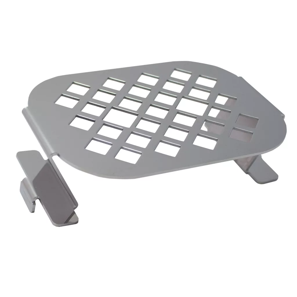 A metal laptop stand with a grid of square cutouts, angled legs, and an elevated design for airflow—just like the raised drip tray in the Lelit MC519Q Raised Drip Tray—for enhanced ergonomics. © 2025 1st-line.com