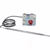 A metal thermostat with a long silver probe, black coiled wire, and rectangular control box with red knob—designed for use with the Rancilio 34200097 High Limit Safety Thermostat - Classe 8 2G. © 2025 1st-line.com