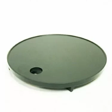 A round, flat black plastic disc with a small hole near the edge—part of the MACAP C0007M115 M4/M5 Drip Tray—is displayed on a plain white background. © 2025 1st-line.com