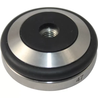 A round metal and black rubber vibration isolation mount with a central threaded hole, marked 47 on the edge, resembling the finish of a Joe Frex/Concept Art 47mm Tamper Base w/ Knock Ring in stainless steel. © 2025 1st-line.com